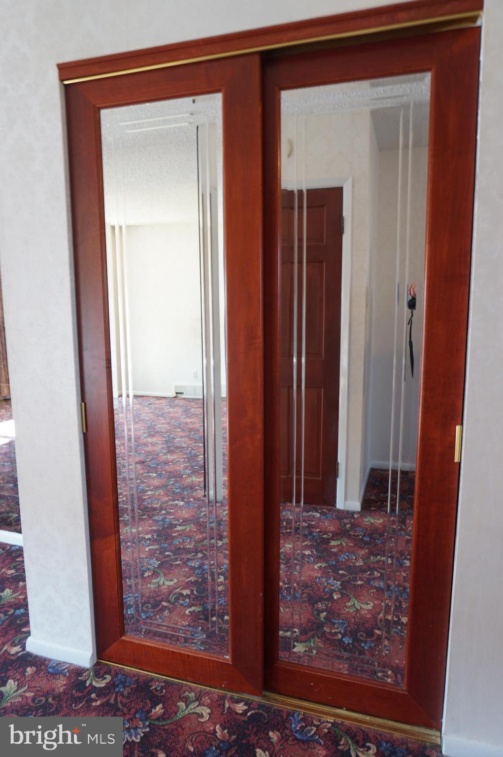 3311 Ancona Road Philadelphia, PA 19154 - Photo 10 of 32 Mirrored Cherry closet doors