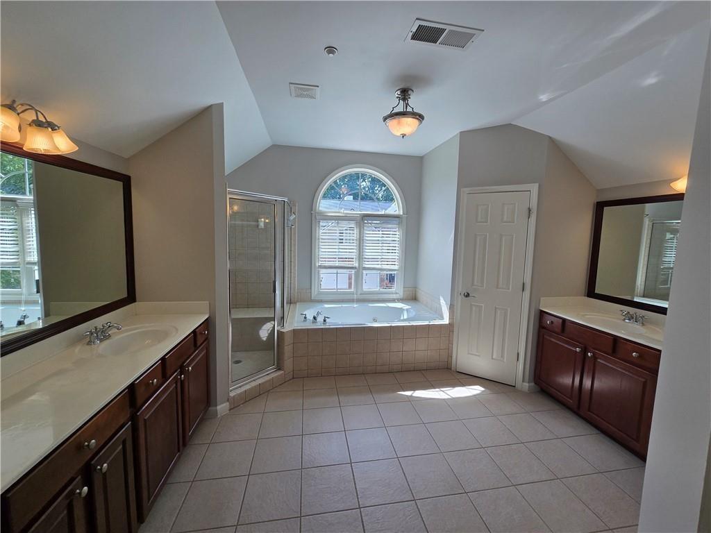 624 Maple Grove Way Marietta, GA 30066 - Photo 13 of 27 a large kitchen with a stove a sink and a refrigerator