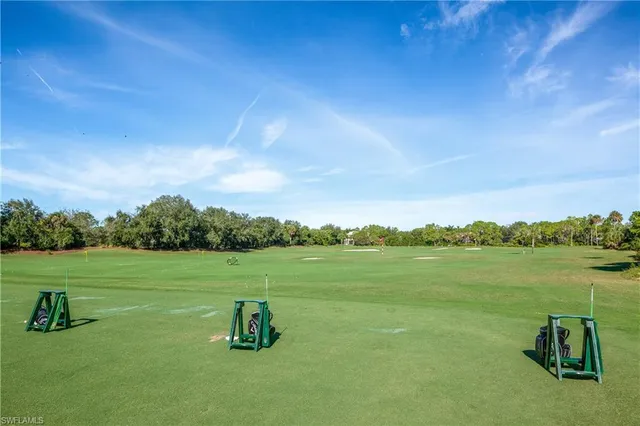 a view of a lake with a yard