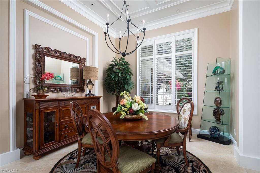 980 Barcarmil Way Naples, FL 34110 - Photo 8 of 50 a view of a dining room with furniture window and outside view