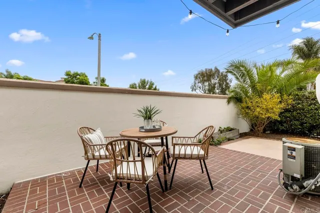a view of an outdoor space with furniture