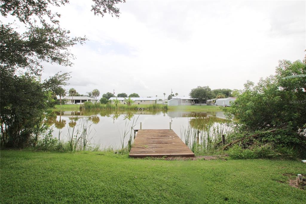1236 Chobee Loop Okeechobee, FL 34974 - Photo 37 of 39 Pond - Dock