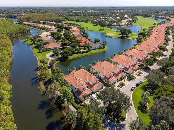 an aerial view of lake residential house with outdoor space