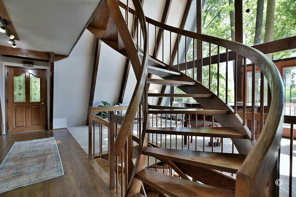 5538 Roaring Branch Road Columbus, GA 31904 - Photo 27 of 54 stunning spiral staircase to the upstairs suite