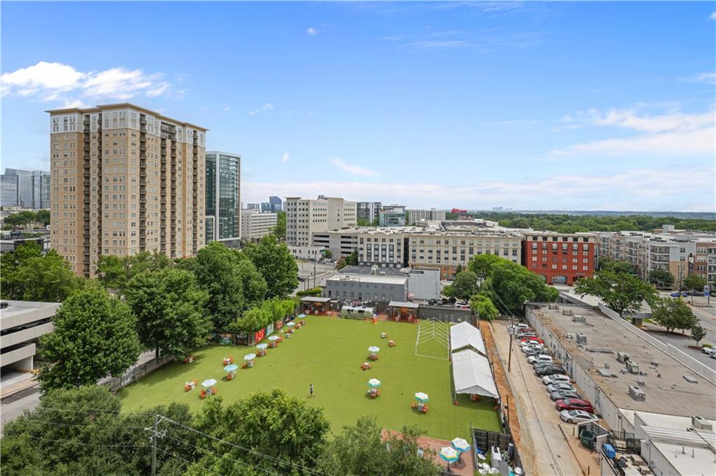 250 Pharr Road Northeast, Unit 606 Atlanta, GA 30305 - Photo 27 of 31 a view of a city with tall buildings