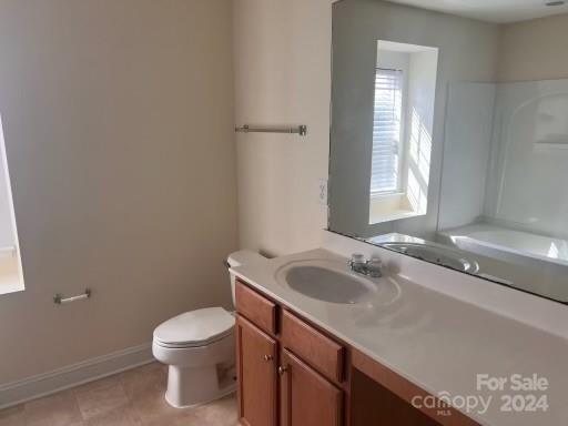 6706 Ferrell Commons Road Charlotte, NC 28269 - Photo 16 of 22 a bathroom with a sink and toilet