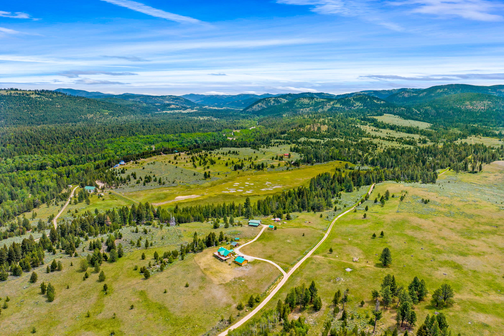 3358 Strandskov Road Lincoln, MT 59639 - Photo 76 of 80 Drone / aerial view of mountains