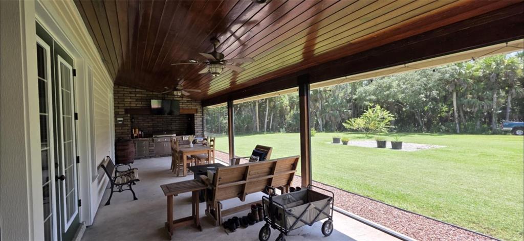 8991 Southwest Springhaven Avenue Indiantown, FL 34956 - Photo 24 of 30 a view of outdoor space with seating area