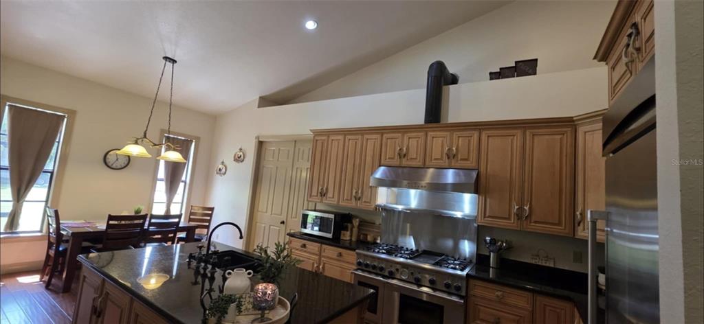 8991 Southwest Springhaven Avenue Indiantown, FL 34956 - Photo 8 of 30 a view of a room with gym equipment