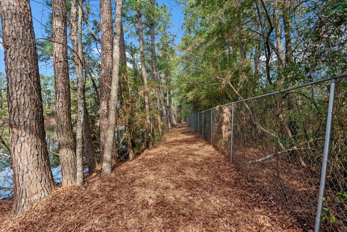 504 Catfish Lane Conroe, TX 77384 - Photo 41 of 48 With HOA lakes, trail, and club house access.