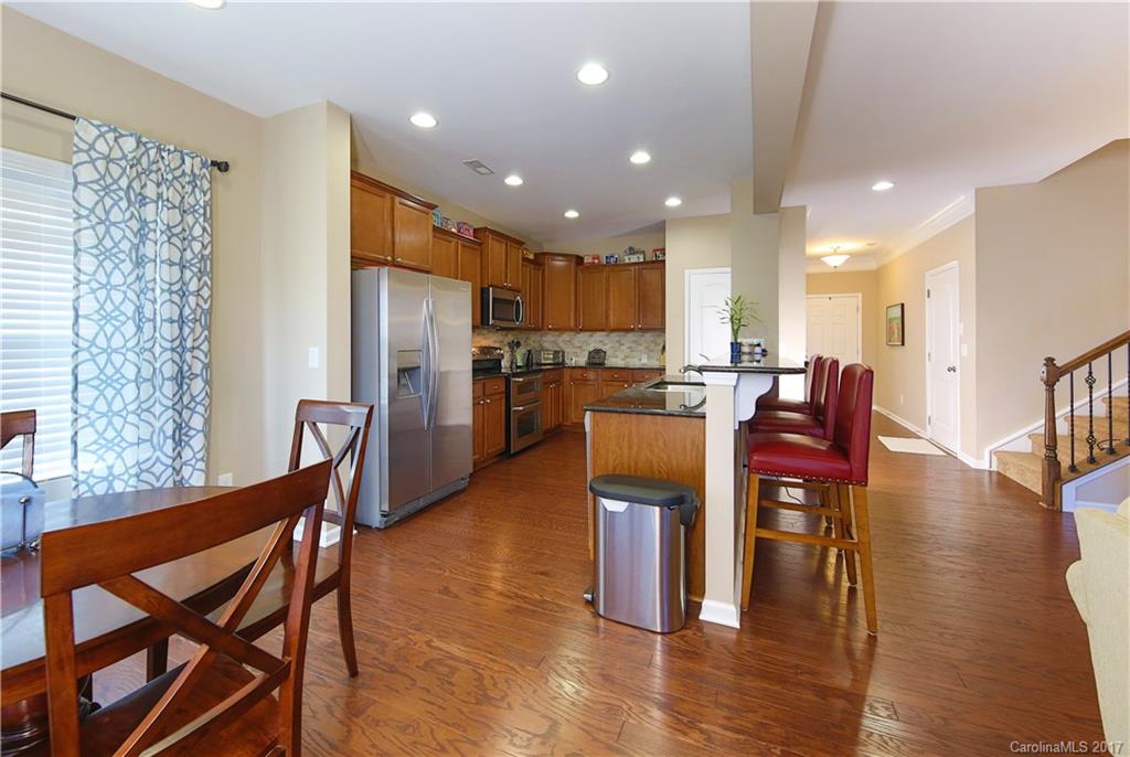 79291 Ridgehaven Road Lancaster, SC 29720 - Photo 12 of 23 a view of a dining room with furniture and wooden floor