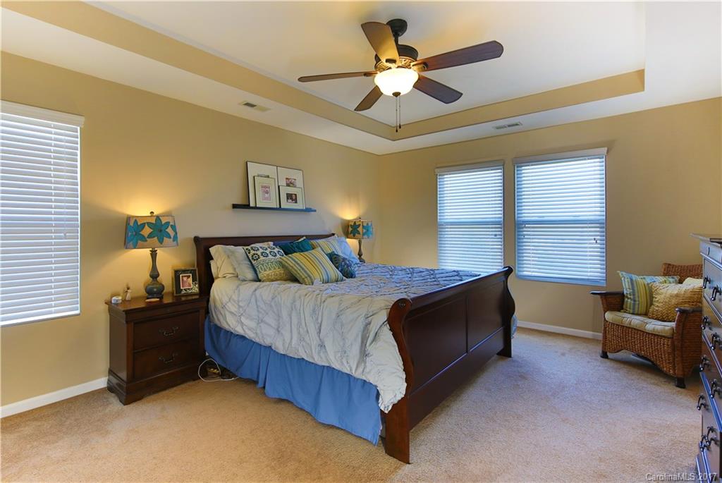 79291 Ridgehaven Road Lancaster, SC 29720 - Photo 14 of 23 a bedroom with a bed couch and window