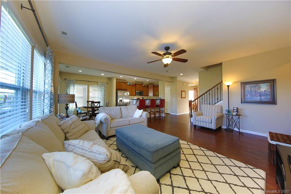 79291 Ridgehaven Road Lancaster, SC 29720 - Photo 4 of 23 a living room with furniture and a chandelier
