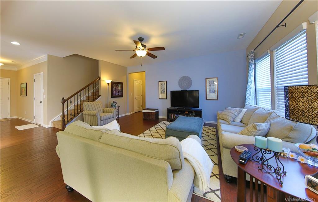 79291 Ridgehaven Road Lancaster, SC 29720 - Photo 7 of 23 a living room with furniture a flat screen tv and a fireplace