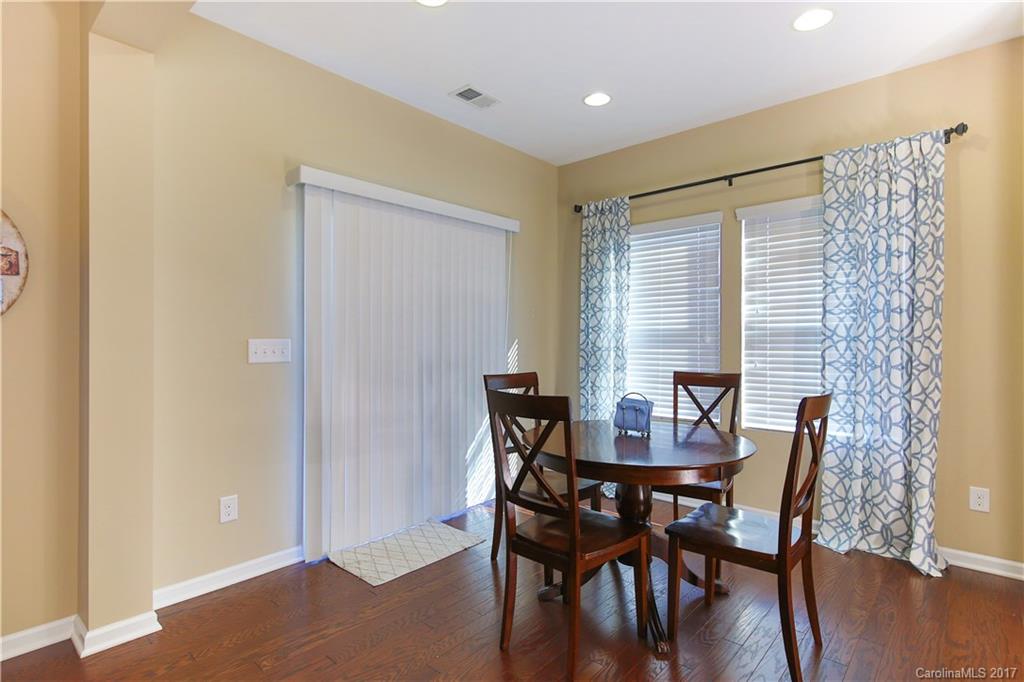 79291 Ridgehaven Road Lancaster, SC 29720 - Photo 8 of 23 a view of a dining room with furniture and wooden floor