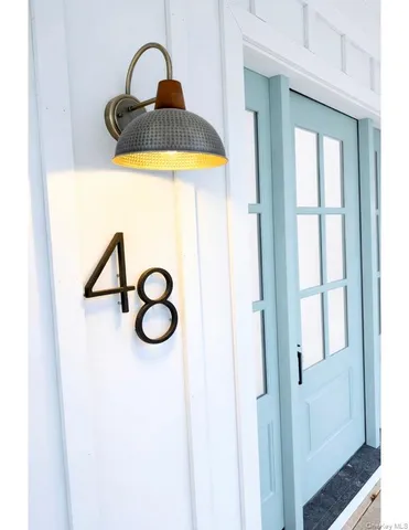 $875,000 | 48 Watchogue Avenue, East Moriches, NY 11940