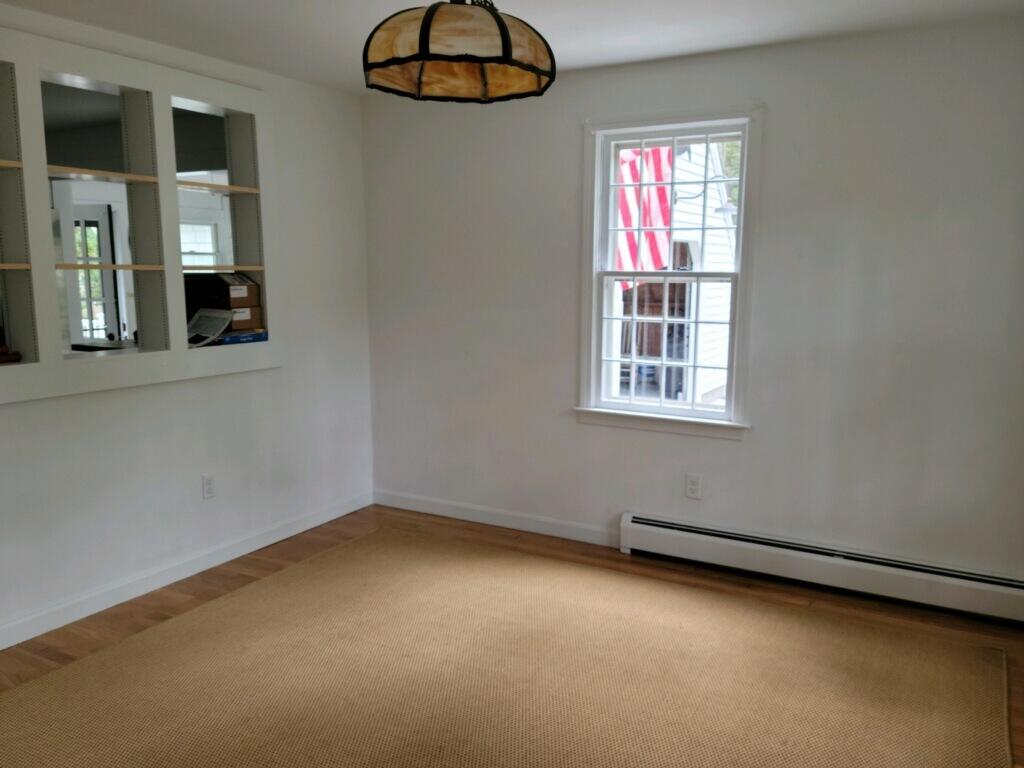 863 Bumps River Road Centerville, MA 02632 - Photo 8 of 22 an empty room with windows