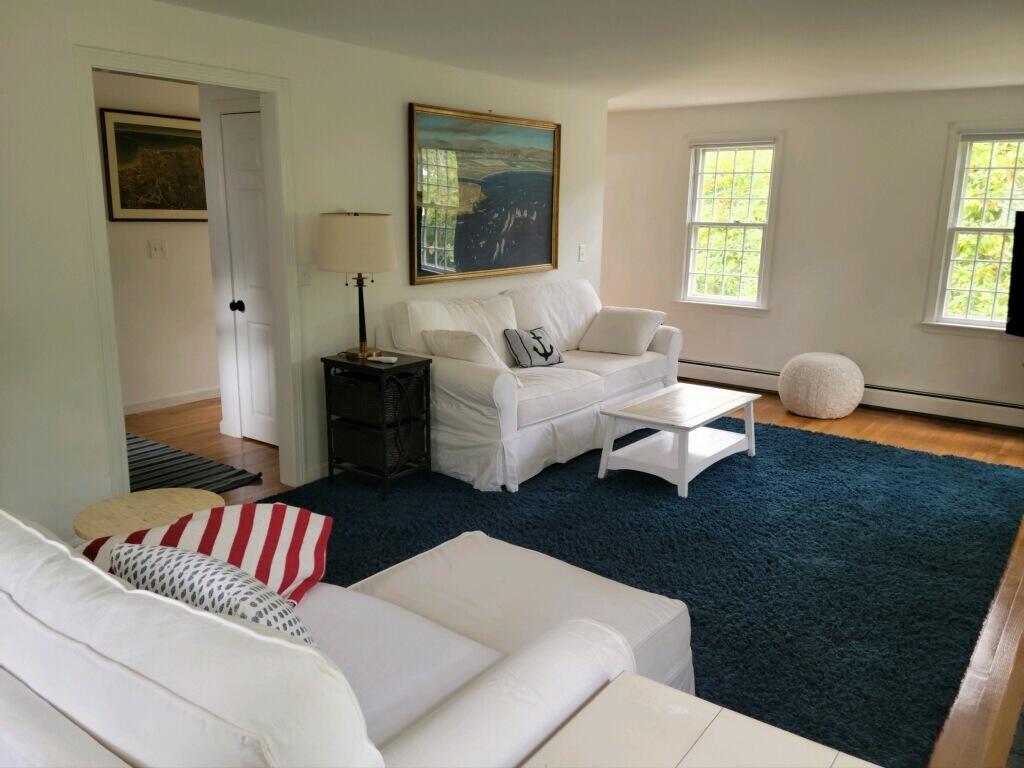 863 Bumps River Road Centerville, MA 02632 - Photo 9 of 22 a living room with furniture and a window