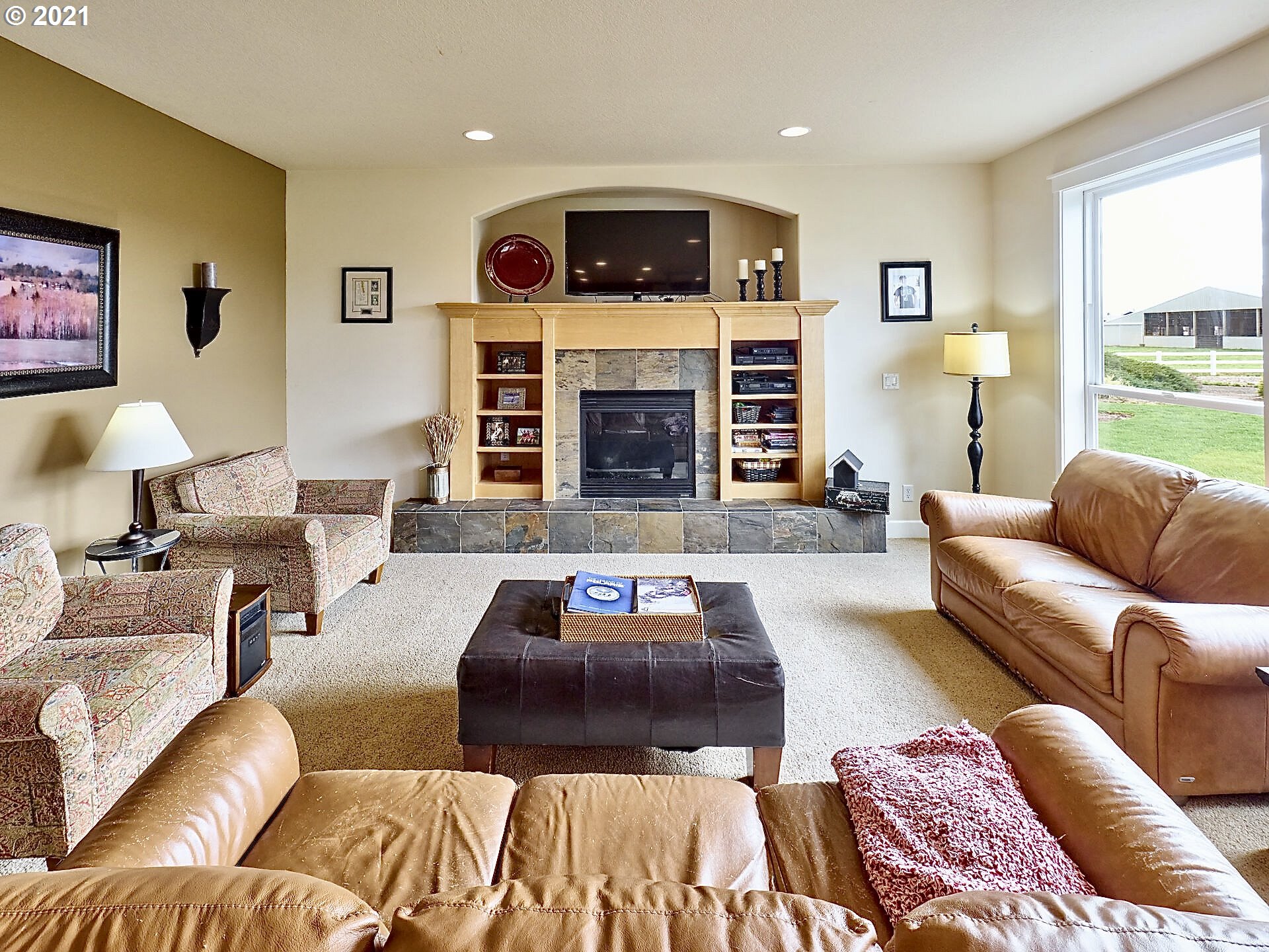 3934 Mission Road Northeast St. Paul, OR 97137 - Photo 13 of 32 a living room with furniture and a fireplace