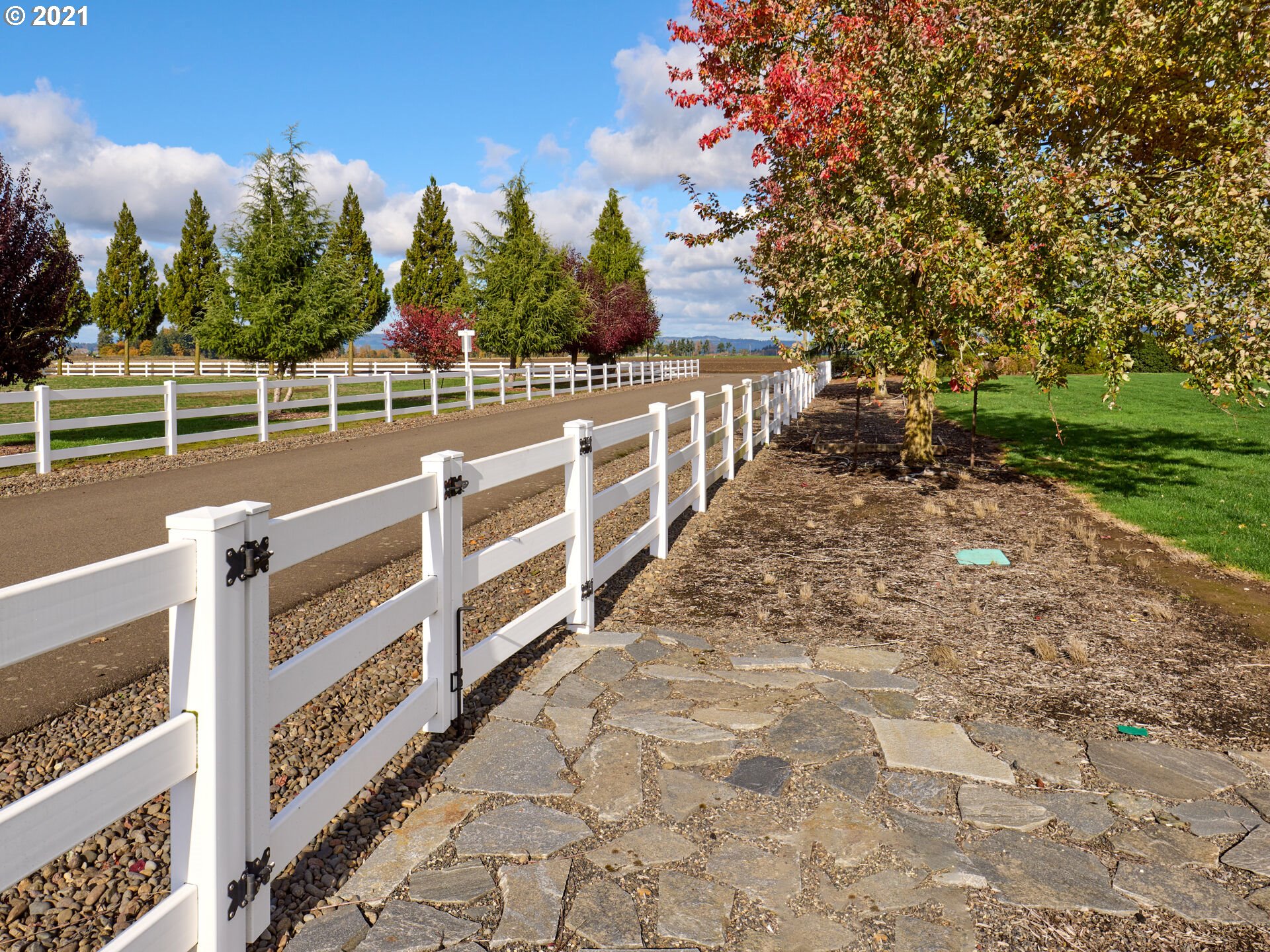 3934 Mission Road Northeast St. Paul, OR 97137 - Photo 26 of 32 a view of a pathway with a wrought fence