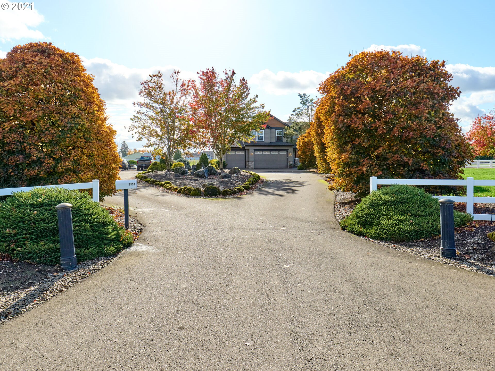 3934 Mission Road Northeast St. Paul, OR 97137 - Photo 28 of 32 a view of a road with plants and a trees