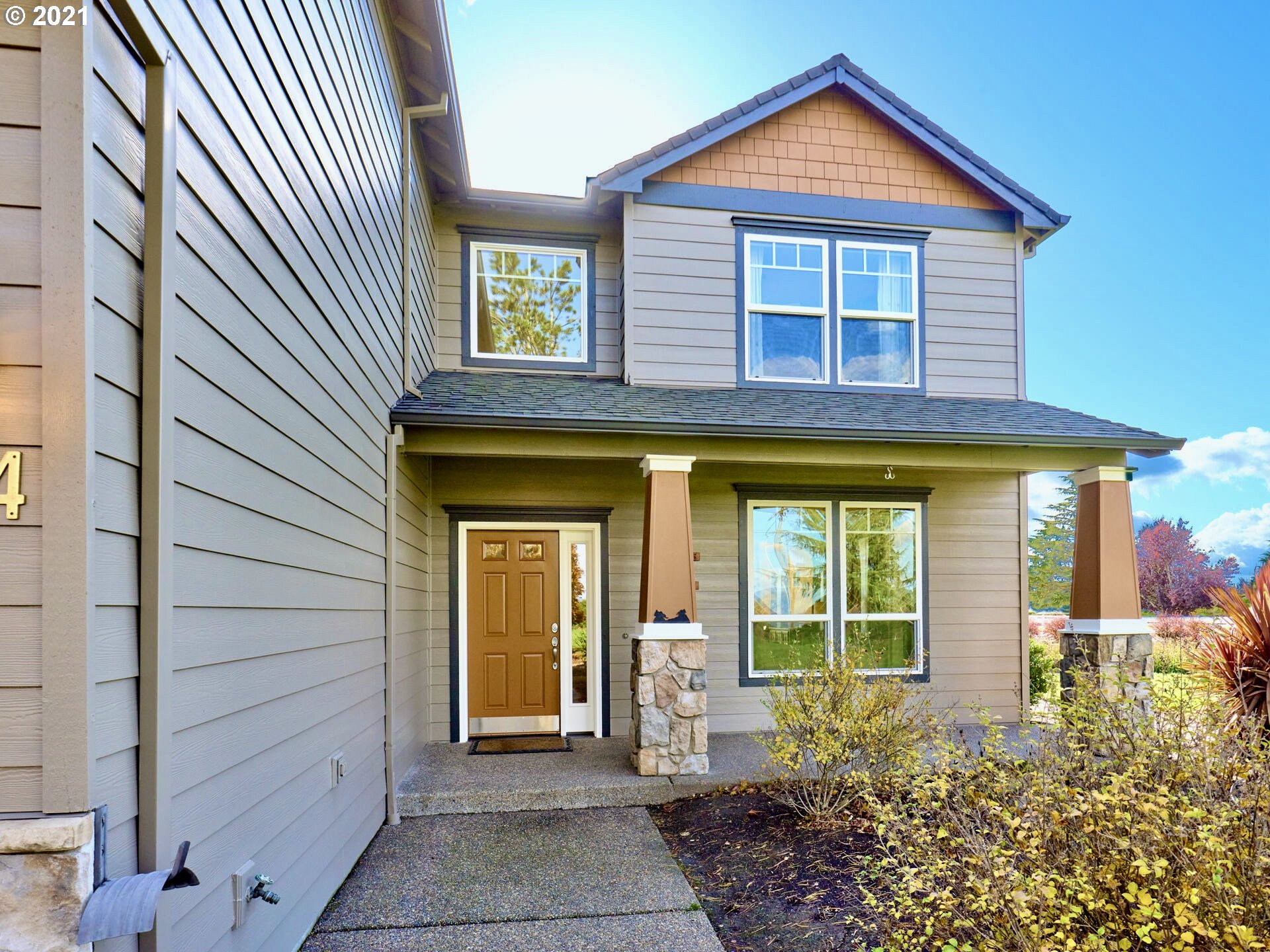 3934 Mission Road Northeast St. Paul, OR 97137 - Photo 4 of 32 a front view of a house with a yard