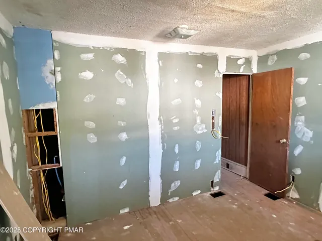 a view of a bathroom with shower