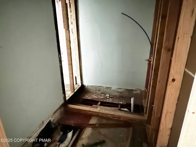 a bathroom with a tub and a sink