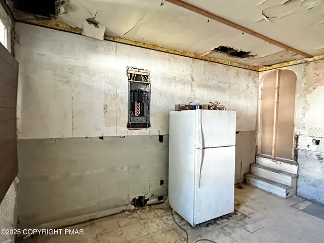 a view of a storage & utility room with washer and dryer
