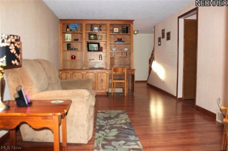 4231 Baird Road Stow, OH 44224 - Photo 11 of 23 Family room with plenty of natural light and a beautiful built in wall unit.
