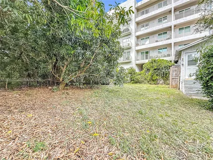 a view of backyard with green space