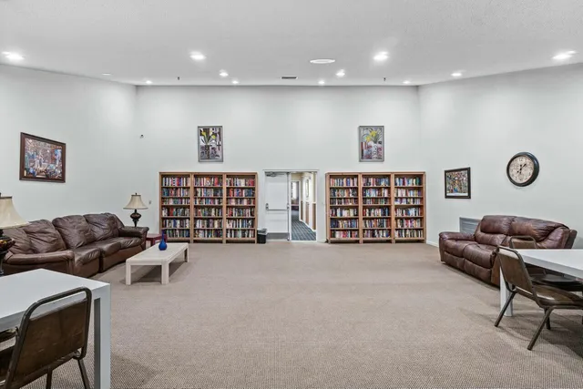 a view of livingroom with furniture and white walls