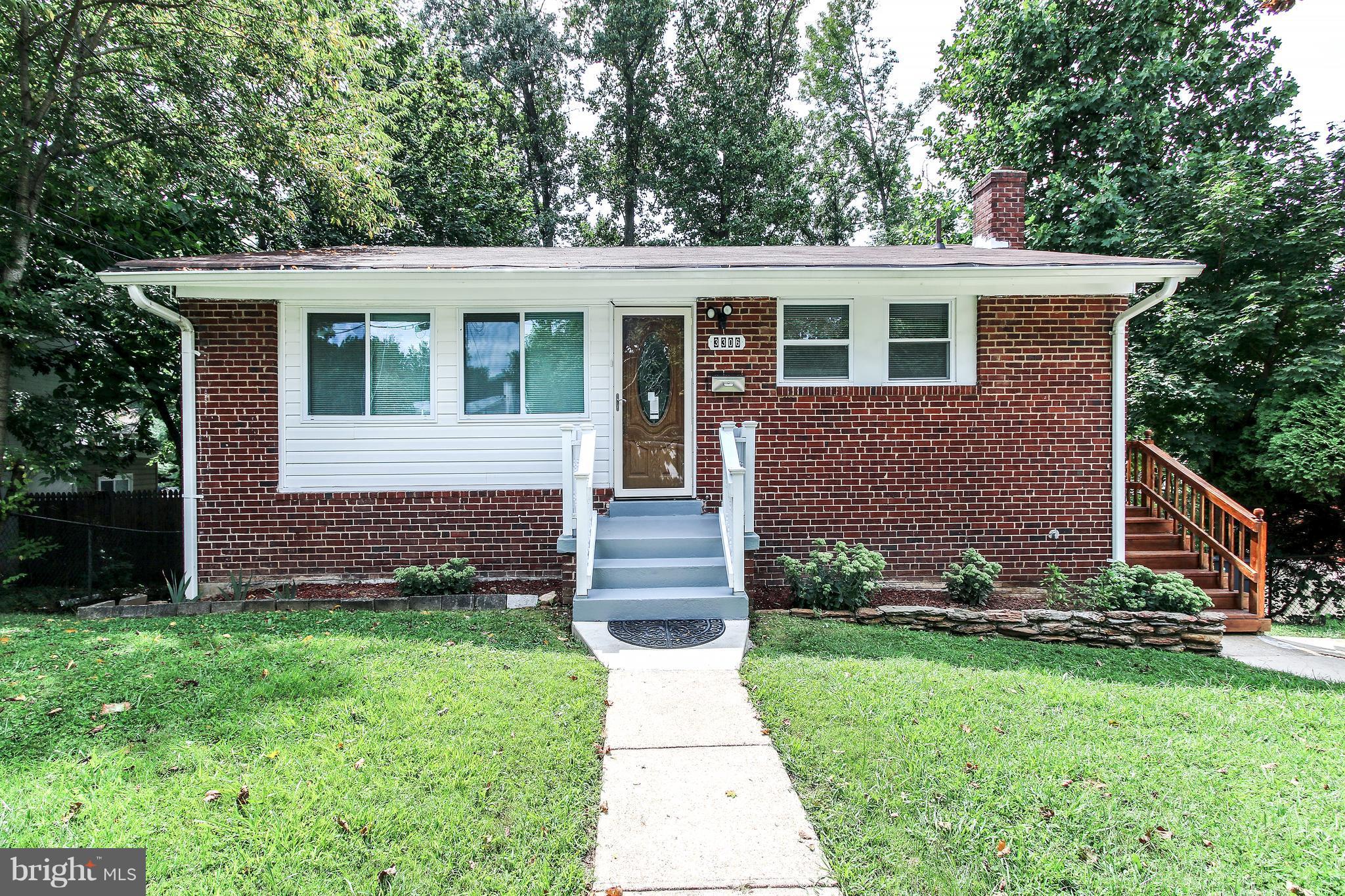 3306 Niles Street Silver Spring, MD 20906 - Photo 1 of 21 a front view of a house with garden