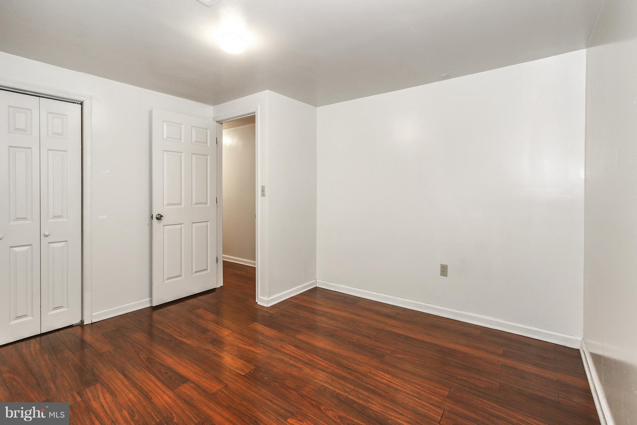 3306 Niles Street Silver Spring, MD 20906 - Photo 16 of 21 a view of an empty room with wooden floor