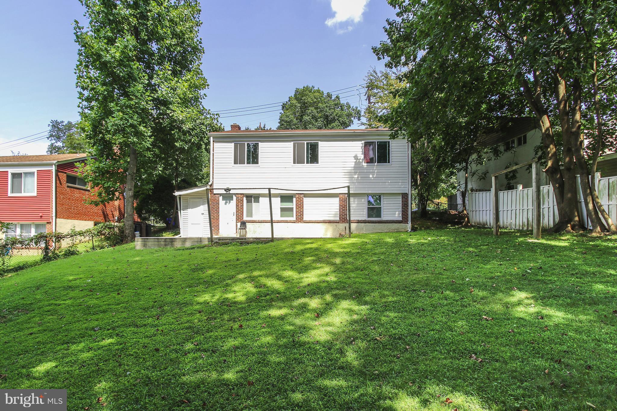 3306 Niles Street Silver Spring, MD 20906 - Photo 20 of 21 a front view of a house with a yard