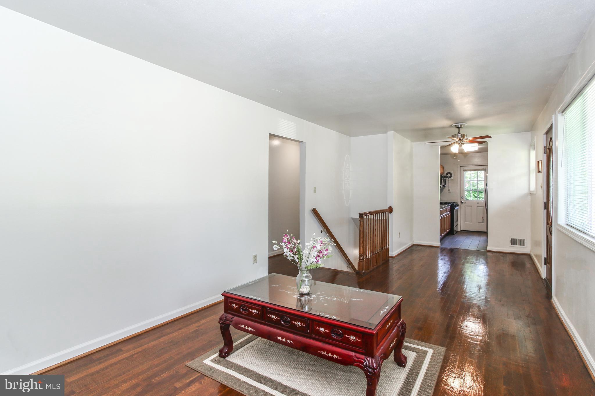 3306 Niles Street Silver Spring, MD 20906 - Photo 4 of 21 a room with furniture and wooden floor