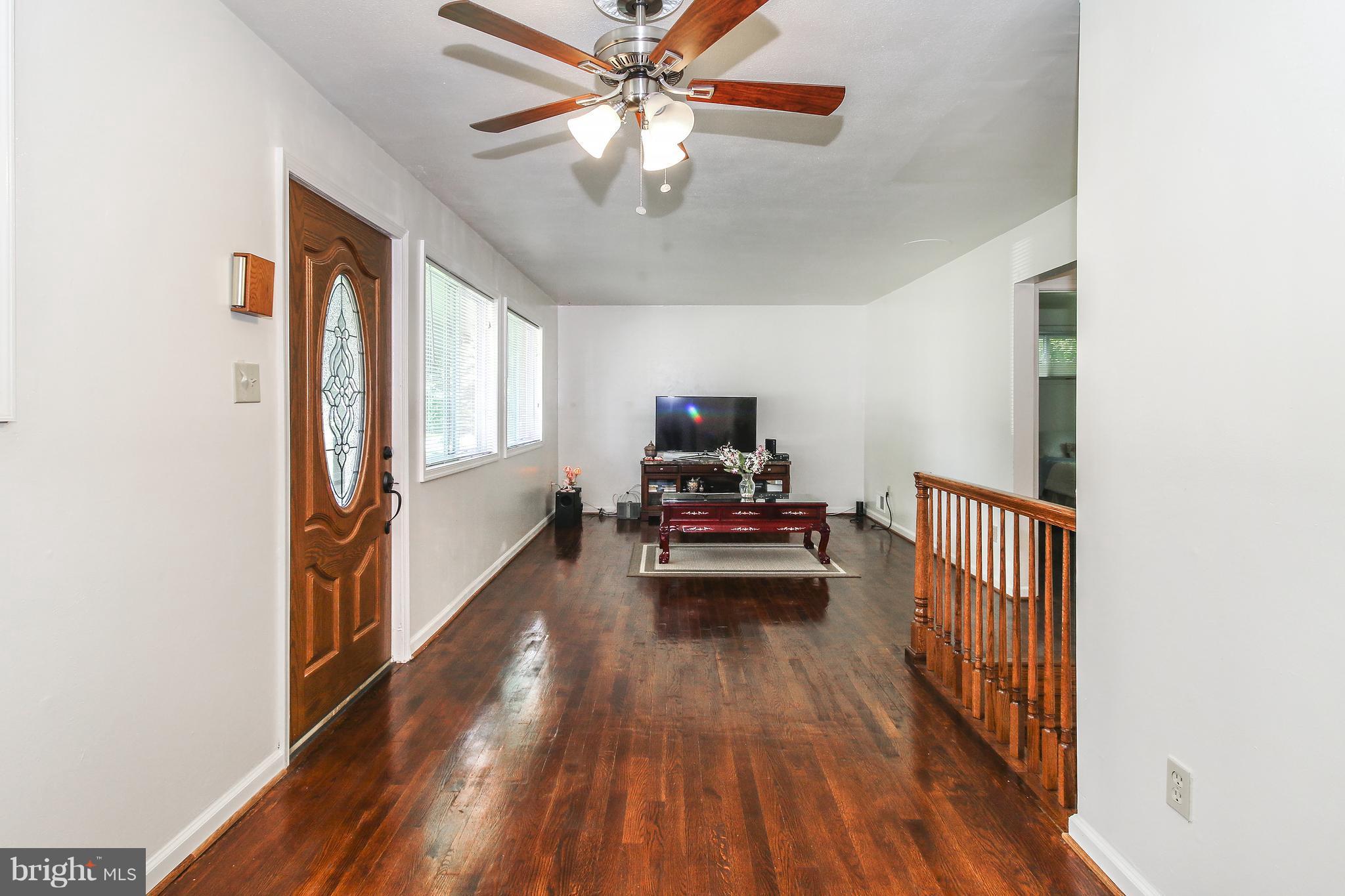 3306 Niles Street Silver Spring, MD 20906 - Photo 5 of 21 a view of living room with furniture and a chandelier