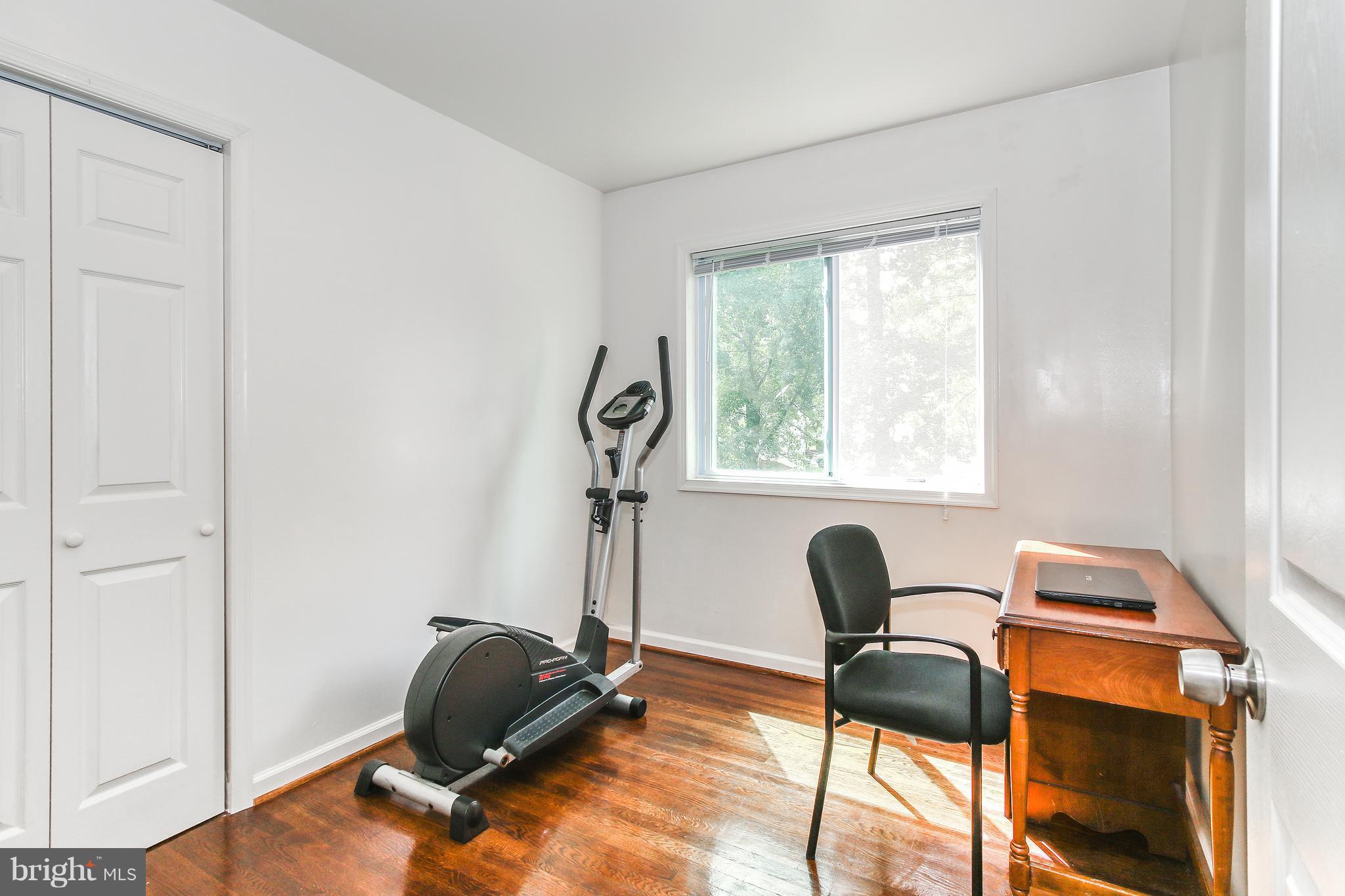 3306 Niles Street Silver Spring, MD 20906 - Photo 10 of 21 a room with furniture and a window