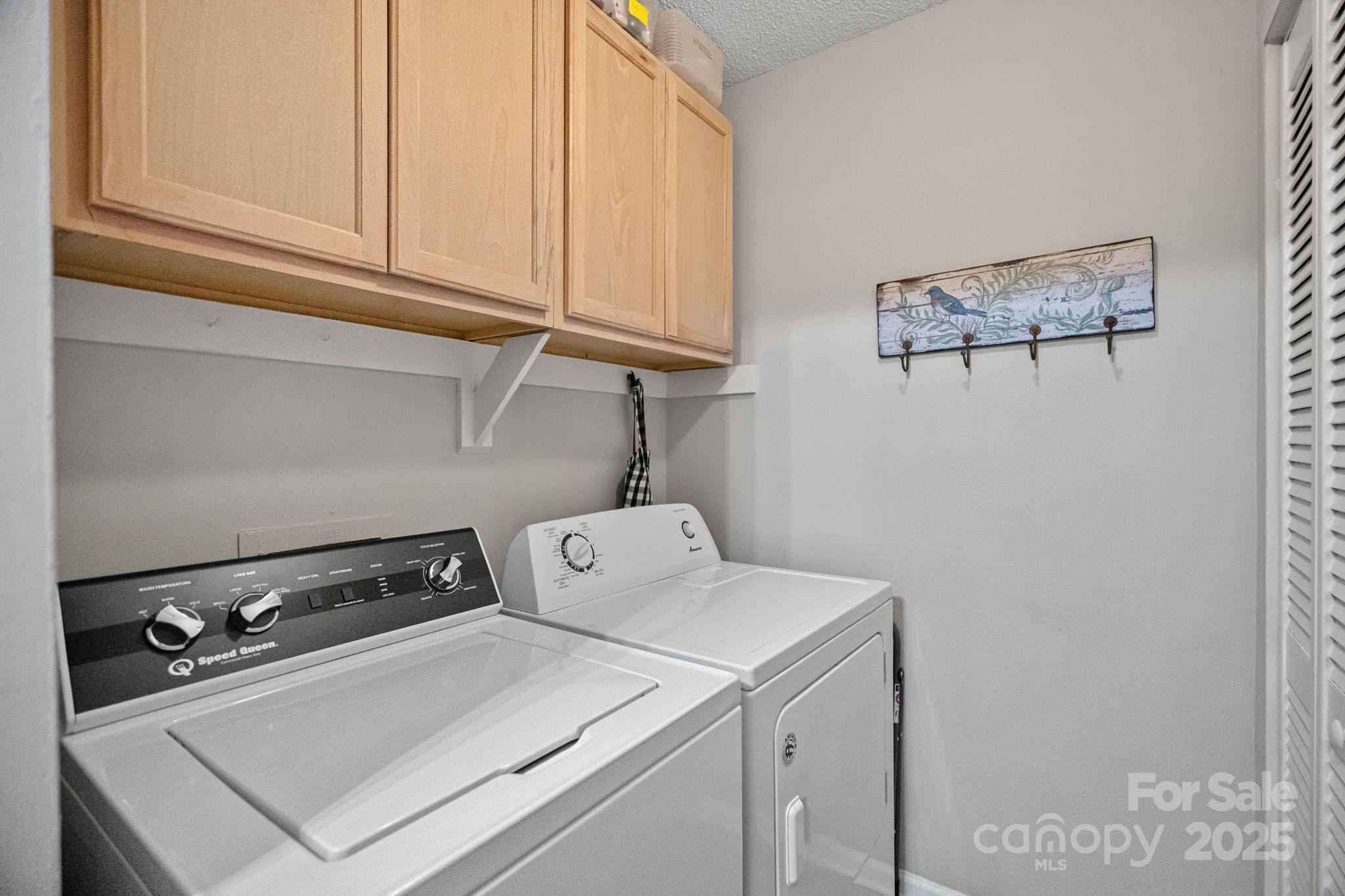 11017 Running Ridge Road Charlotte, NC 28226 - Photo 17 of 27 a utility room with dryer and washer