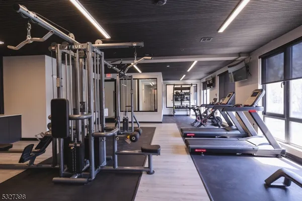 a view of a room with gym equipment