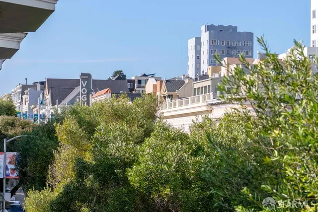 an aerial view of a city with lots of residential buildings