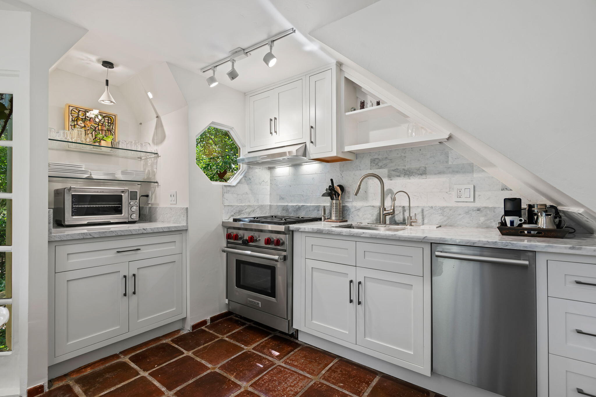 0 Picacho Lane Montecito, CA 93108 - Photo 13 of 25 a kitchen with white cabinets and appliances