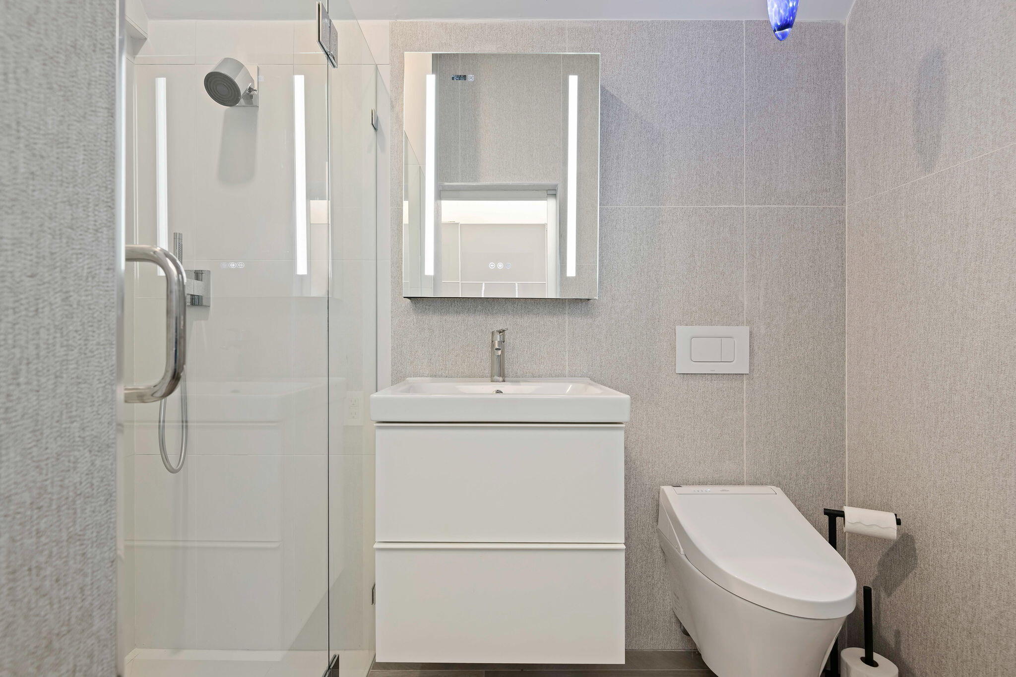 0 Picacho Lane Montecito, CA 93108 - Photo 18 of 25 a bathroom with a toilet sink vanity and mirror