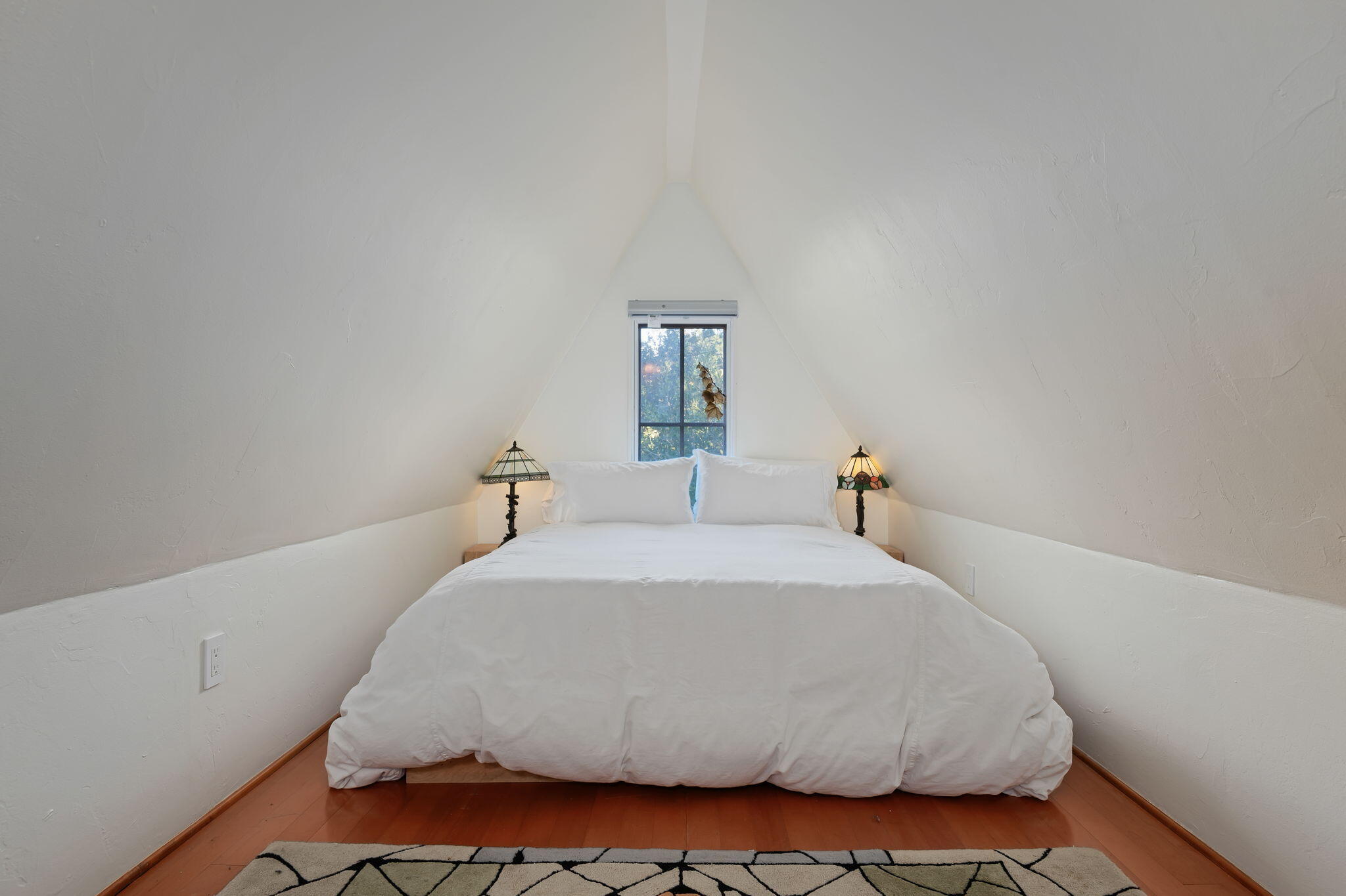 811 Picacho Lane Montecito, CA 93108 - Photo 21 of 22 a bedroom with a bed and window