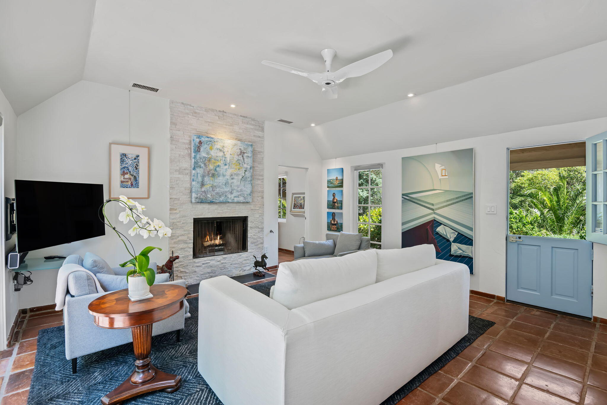 0 Picacho Lane Montecito, CA 93108 - Photo 10 of 25 a living room with furniture a fireplace and a flat screen tv