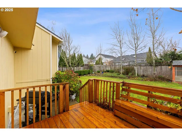 a view of balcony with wooden floor