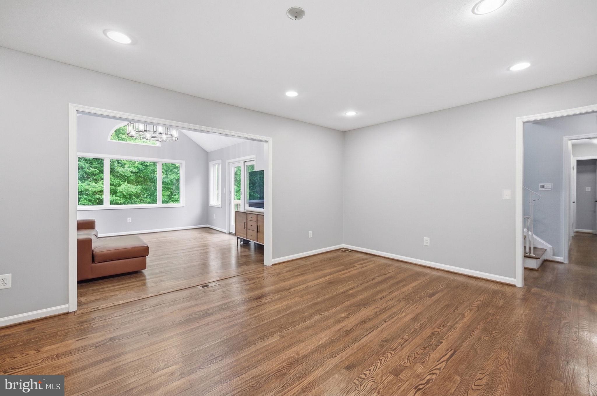 2506 Pinoak Lane Reston, VA 20191 - Photo 7 of 33 a view of a livingroom with furniture window and wooden floor
