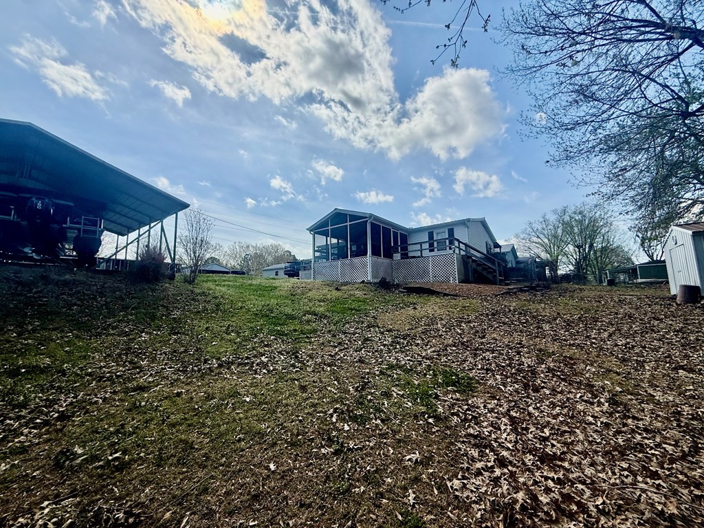 220 Sullivan Drive Springville, TN 38256 - Photo 17 of 17 a view of a house with a yard