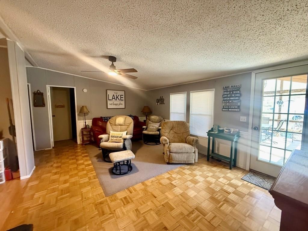 220 Sullivan Drive Springville, TN 38256 - Photo 2 of 17 a bedroom with furniture and a large window