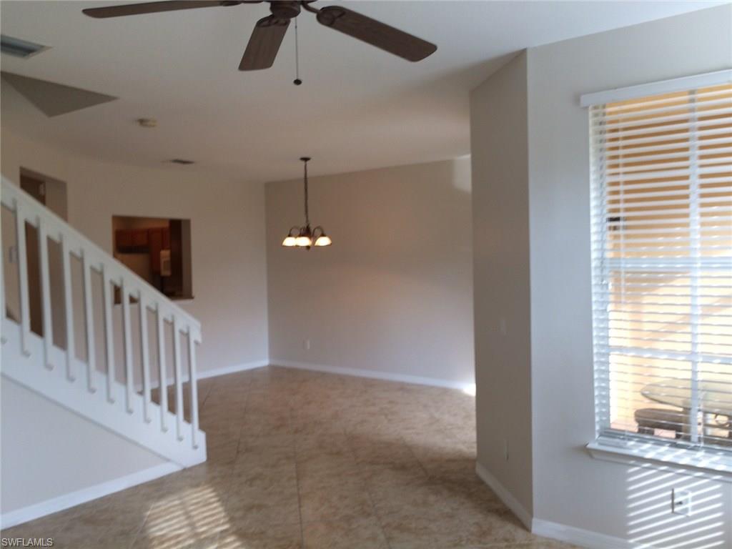 3954 Cherrybrook Loop Fort Myers, FL 33966 - Photo 3 of 16 a view of an empty room with a window